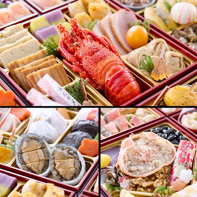 伊勢海老やあわびなど、重箱に盛られたおせちの料理のアップ